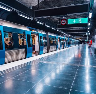 Metro station with underground train and people passengers. Public transportation. Transport. Subway